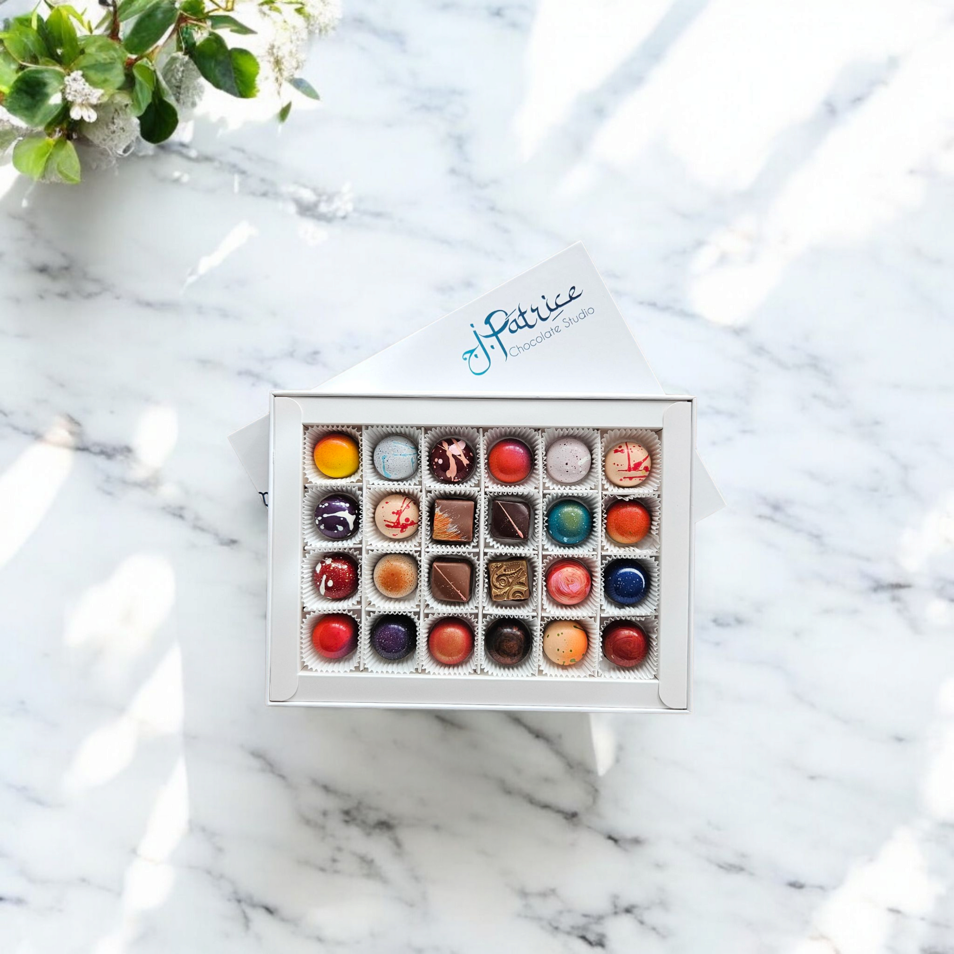 Large luxury chocolate box featuring assorted bonbons