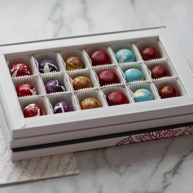 Elegant chocolate box with special decorations.