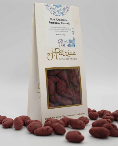 Raspberry almonds dipped in dark chocolate