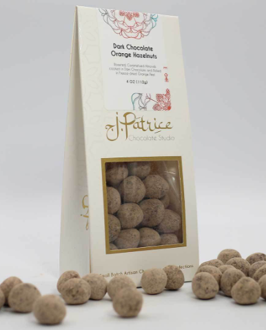 Zesty dark chocolate-coated orange-flavored hazelnuts