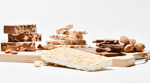 Side-by-side view of white chocolate and almond bark, showcasing their unique appearances.