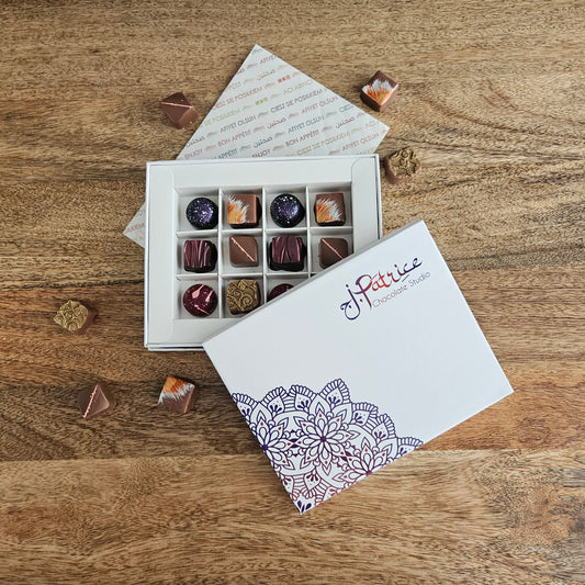 12 Piece Classic Collection featuring an assortment of timeless chocolates in a beautifully designed box.