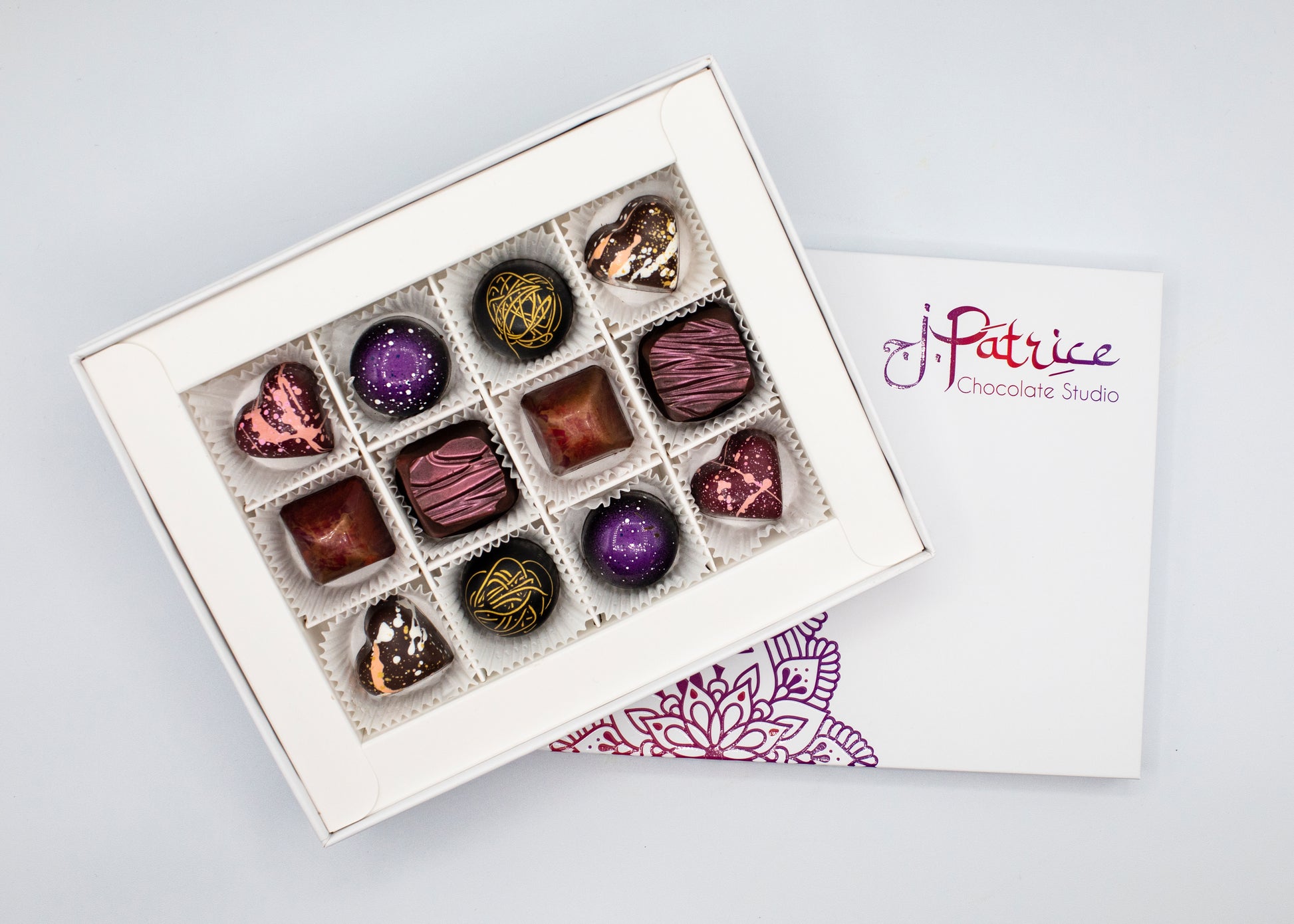 12 Piece Dark Chocolate BonBon Collection Box featuring an exquisite selection of rich dark chocolate bonbons.