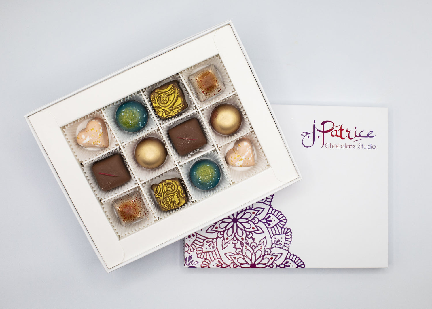 12 Piece Milk Chocolate BonBon Collection Box filled with a variety of rich and creamy milk chocolate bonbons.