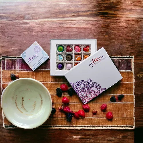 A dozen artisan bonbons in elegant packaging