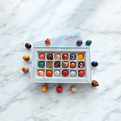 Elegant 18-piece chocolate box with marble backdrop