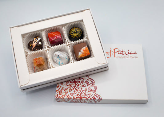 6 Piece Cafe BonBon Collection Box filled with a variety of gourmet bonbons inspired by café flavors.