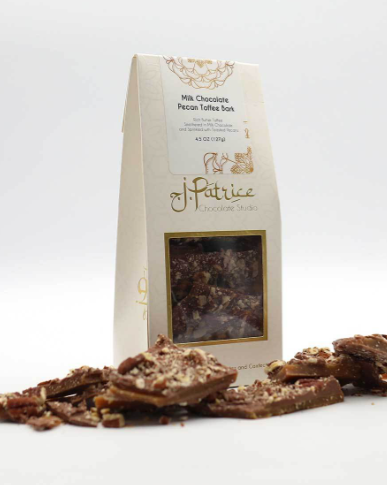 Pack of Milk Chocolate Pecan Toffee Bark showcasing crunchy toffee and pecans covered in rich milk chocolate.